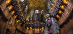 A visitor takes a picture inside the Chapel of the Order of the Thistle,  in St Giles' Cathedral,  Royal Mile,  Edinburgh